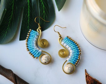 Light blue macrame with white howlite beads on brass bohemian style earrings