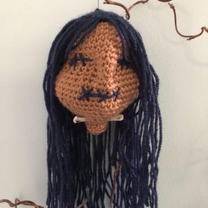 Shrunken head crocheted decorations