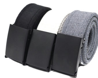 May include: Three canvas belts with black metal buckles. The belts are in black, gray, and white.
