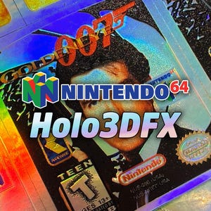 May include: A holographic GoldenEye 007 Nintendo 64 game cartridge label featuring a portrait of a man in a suit. The label includes the Nintendo 64 logo, a Teen ESRB rating, Rareware logo, and the text Holo3DFX, all set against a shimmering black background.