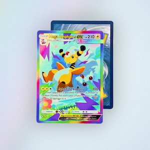 May include: A Mega Ampharos EX trading card featuring a yellow creature with black stripes and a red orb on its head. The card has a rainbow border, 210 HP, and the Lightning Lancer attack text. It is layered over another blue-backed card.