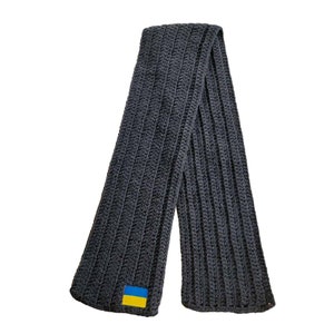 Hand knitted scarf with Ukrainian flag patch