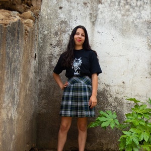 BUY THE LOOK Hello and Meow vintagepleated blue, green &grey plaid skirt with ablack short-sleeved cat print tshirt Small to Medium image 1