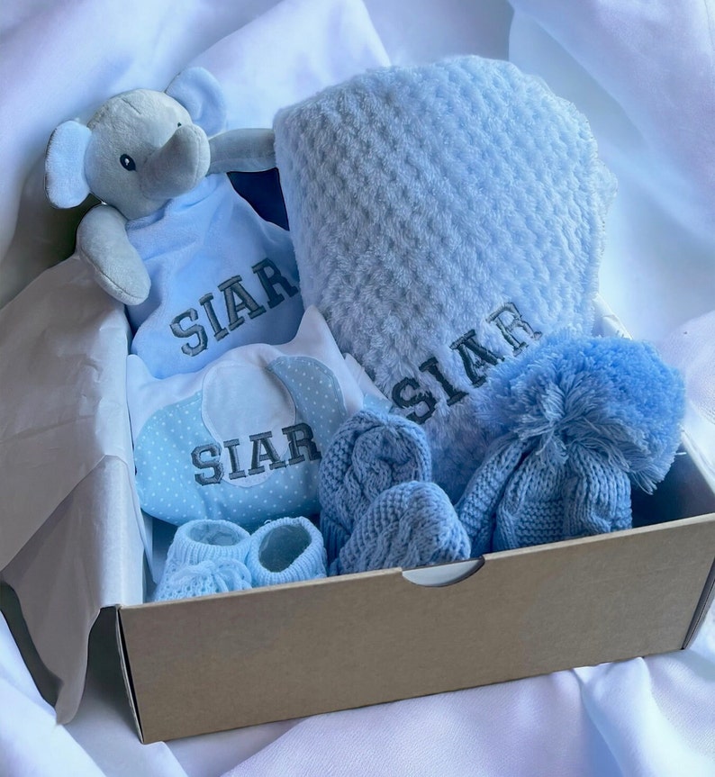 Personalised Baby Gift Set, cosy elephant comforter, bib, a soft blanket, knit hat, mittens and booties. Baby shower gift, baby gift, welcome baby items, baby gift ideas, personalised baby gift ideas, personalised baby blanket