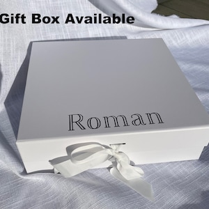 personalised white gift box with magnetic close and ribbon to tie closed.