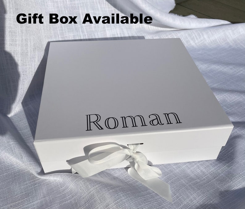 personalised white gift box with magnetic close and ribbon to tie closed.