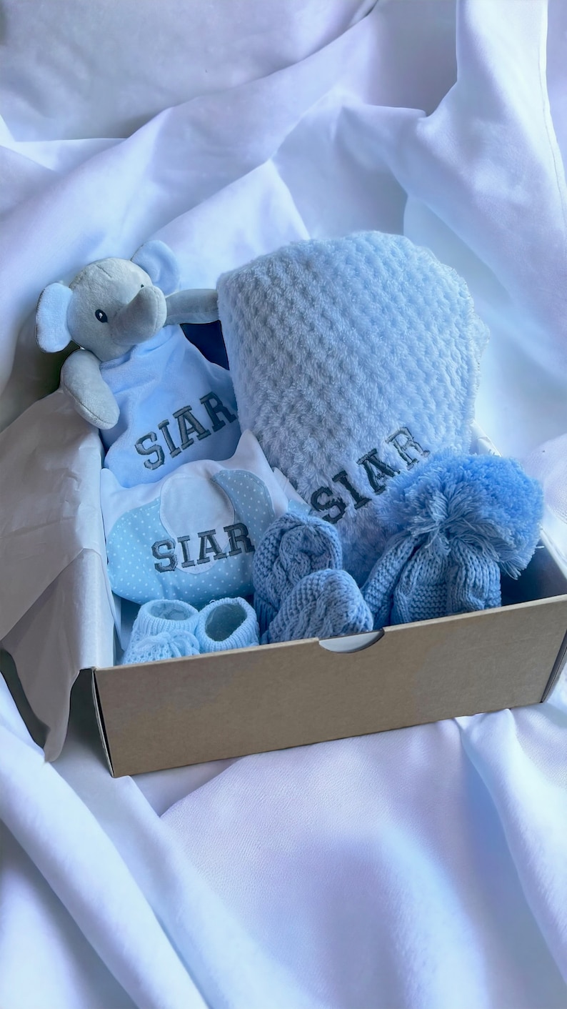 Personalised Baby Gift Set, cosy elephant comforter, bib, a soft blanket, knit hat, mittens and booties. Baby shower gift, baby gift, welcome baby items, baby gift ideas, personalised baby gift ideas