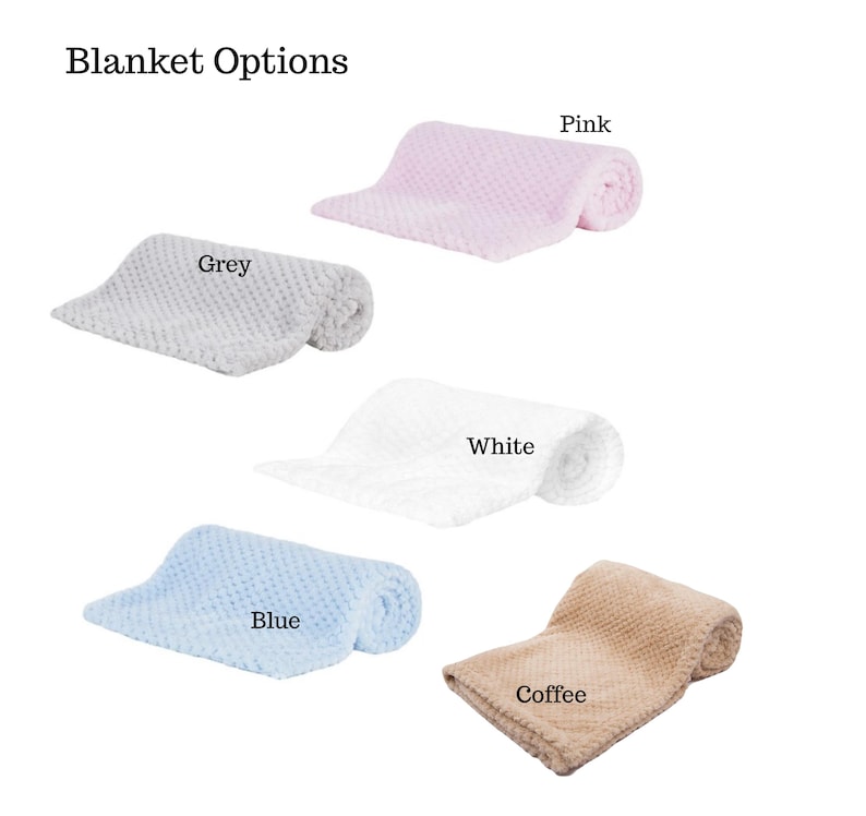 May include: A selection of soft, textured blankets in various colors, including grey, pink, white, blue, and coffee. Each blanket is folded and rolled, showcasing the different color options available. The text "Blanket Options" is at the top.