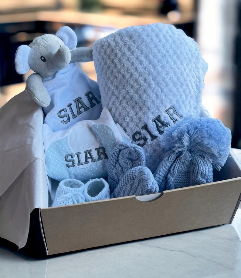 Personalised Baby Gift Set, cosy elephant comforter, bib, a soft blanket, knit hat, mittens and booties. Baby shower gift, baby gift, welcome baby items, baby gift ideas, personalised baby gift ideas