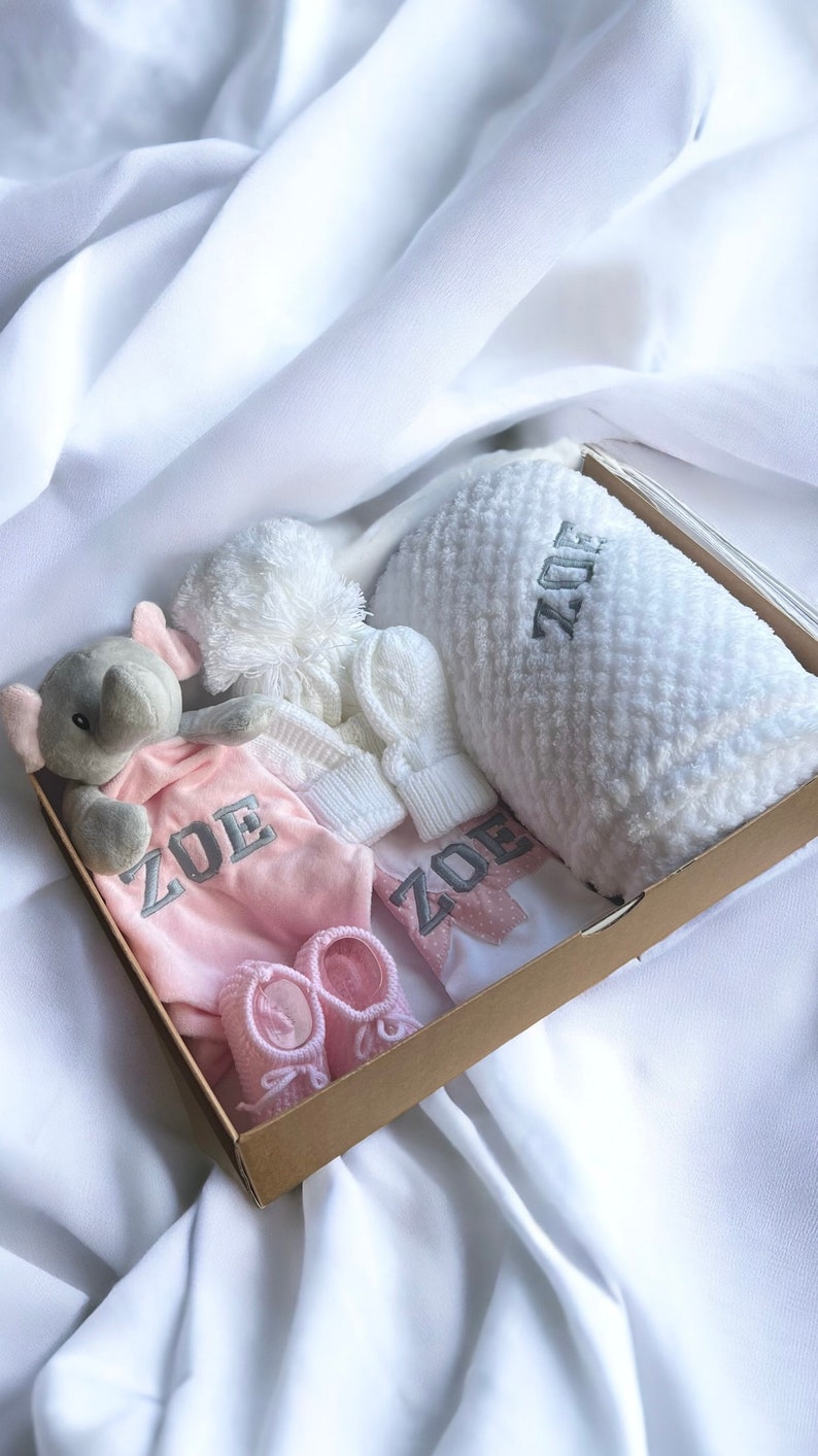 Personalised Baby Gift Set, cosy elephant comforter, bib, a soft blanket, knit hat, mittens and booties. Baby shower gift, baby gift, welcome baby items, baby gift ideas, personalised baby gift ideas
