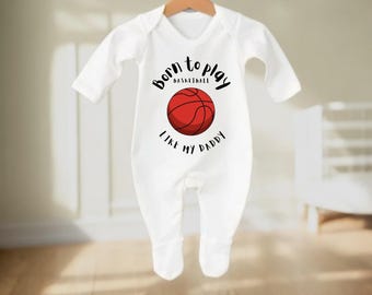 May include: White baby onesie with a red basketball and the text "Born to play basketball like my daddy".