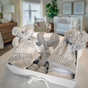 Personalised Baby Gift Set, cosy elephant comforter, bib, a soft blanket, knit hat, mittens and booties. Baby shower gift, baby gift, welcome baby items, baby gift ideas, personalised baby gift ideas