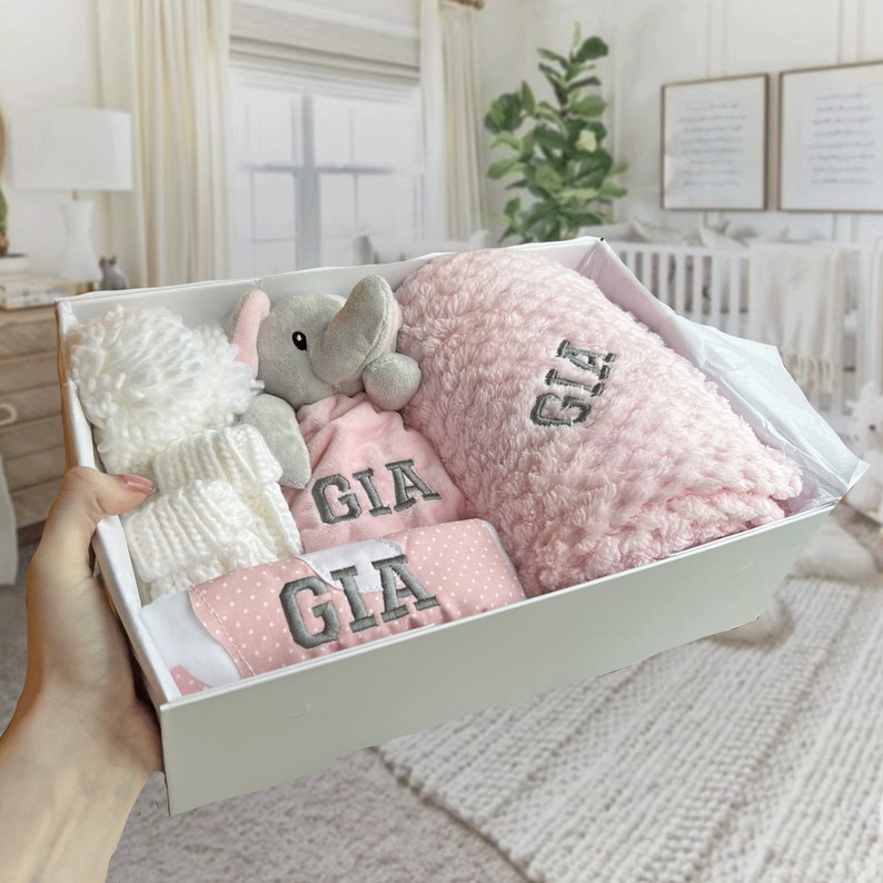 Personalised Baby Gift Set, cosy elephant comforter, bib, a soft blanket, knit hat, mittens and booties. Baby shower gift, baby gift, welcome baby items, baby gift ideas, personalised baby gift ideas