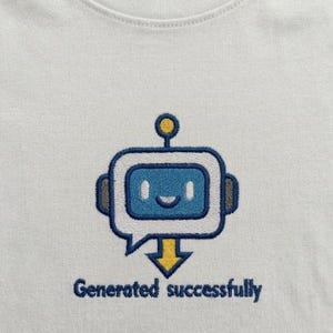 May include: White t-shirt featuring an embroidered robot design. The robot is blue and white with a yellow antenna and a smiling face. The text "Generated successfully" is embroidered in blue below the robot.