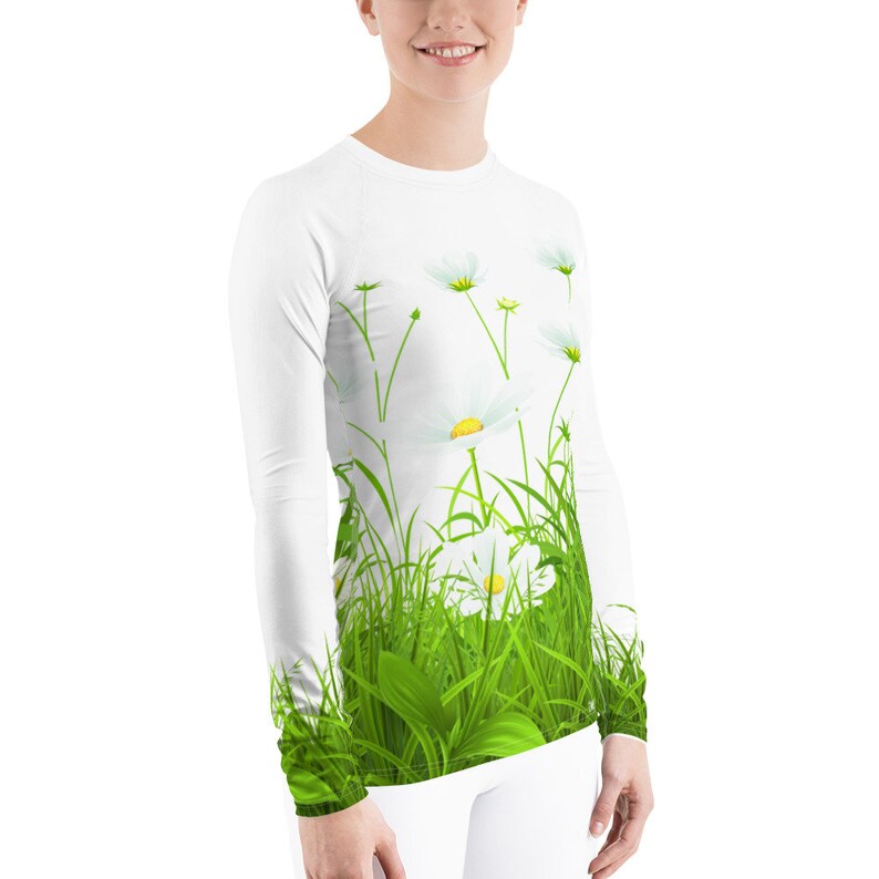bright sports shirt with flowers print comfortable sirt for walks. protective skin with long sleeves White Rash Guard with camomiles