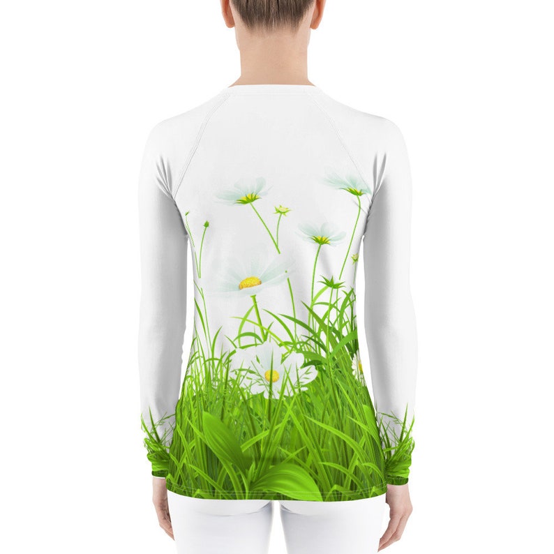 bright sports shirt with flowers print comfortable sirt for walks. protective skin with long sleeves White Rash Guard with camomiles