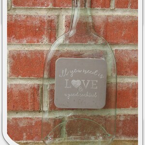 A &quot;All you need is love and a good cocktail&quot; slumped bottle plaque