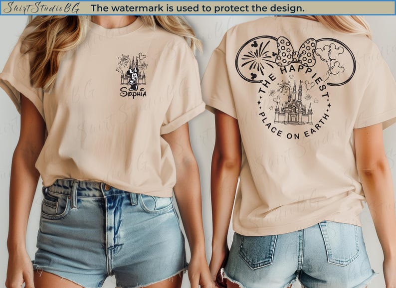 May include: Beige t-shirt with a black graphic on the front featuring a castle, Minnie Mouse, and the name "Sophia." The back of the shirt has a design with the text "The Happiest Place on Earth."