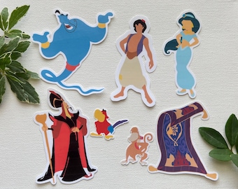 May include: A set of six colorful cartoon stickers featuring characters from the Disney movie Aladdin. The stickers include Aladdin, Jasmine, Genie, Jafar, Abu, and the Magic Carpet.