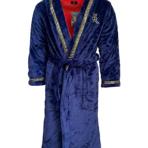 May include: A navy blue robe with a gold trim and a gold embroidered crown and letter "R" on the chest.
