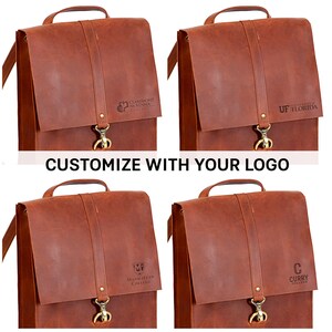 four brown leather messenger bags with various logos and text, including the University of Florida logo, suggesting that the bags are customizable with a logo of your choice.