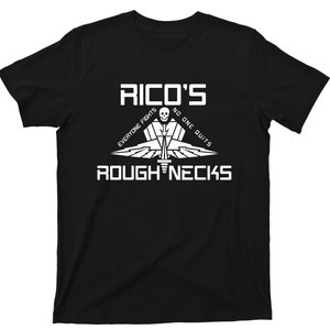 May include: Black t-shirt with white text that reads "RICO'S EVERYONE FIGHTS NO ONE QUITS ROUGHNECKS". The text is arranged in a circle around a stylized skull and wings.