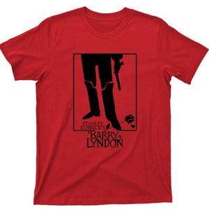 May include: Red t-shirt featuring a black graphic from Stanley Kubrick's film "Barry Lyndon." The design includes a silhouette of a person's legs, a pistol, and a rose. The film's title is printed below the graphic.