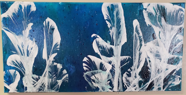 x 24 in 12 in teal and white. wrapped canvas pulled string floral in blue
