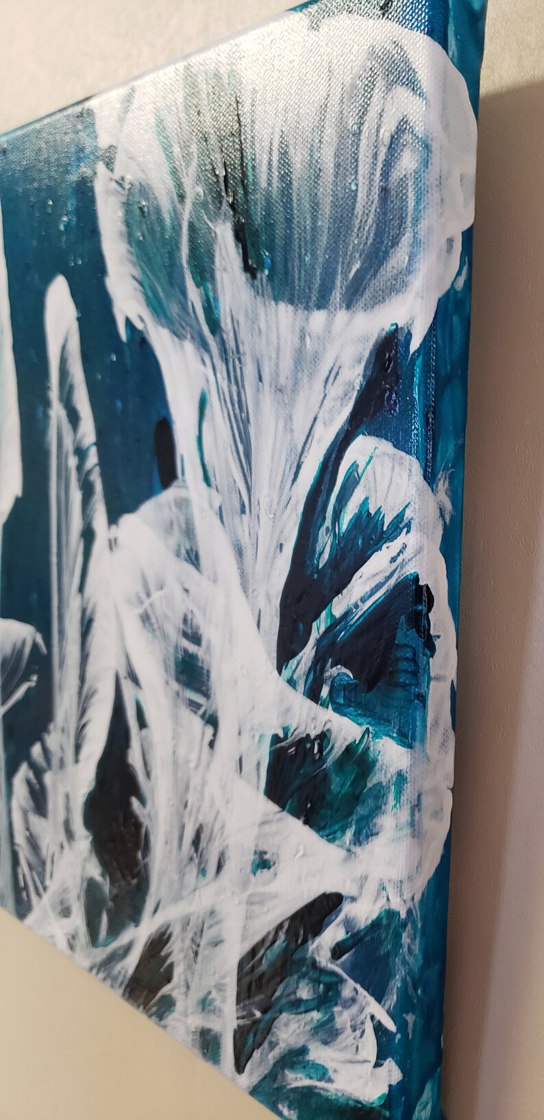 x 24 in 12 in teal and white. wrapped canvas pulled string floral in blue