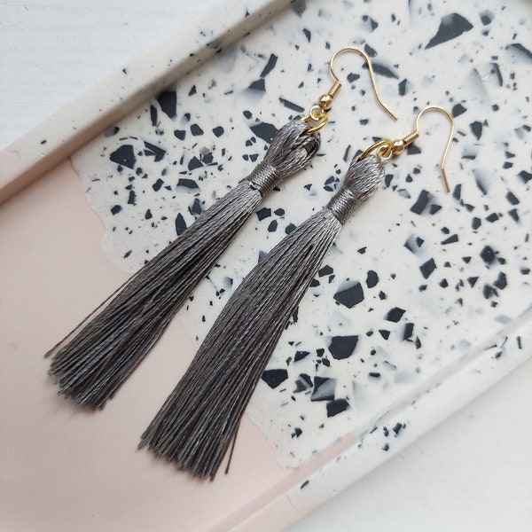 Grey tassel earrings in a stunning neutral colour with gold or silver colour fish hooks make a statement!