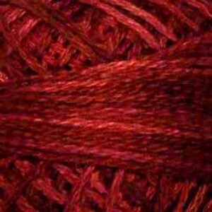 May include: Close-up of a deep red yarn with a subtle shimmer. The yarn is made of a blend of fibers, creating a textured look.