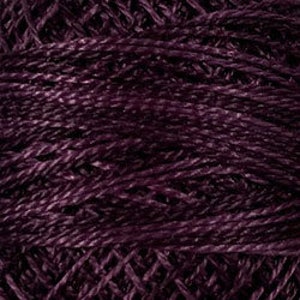 May include: A skein of deep purple yarn with a subtle shimmer. The yarn is made of a blend of fibers, creating a textured look.