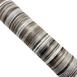 May include: A roll of striped fabric with silver, black, white, and brown stripes. The fabric has a textured, woven look.