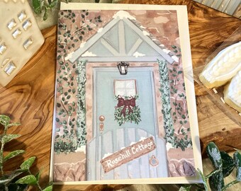 Ilustración de Rose Hill Cottage. Tarjeta de felicitación navideña hecha a mano en papel de lino.