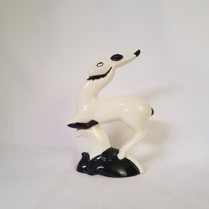 Art Deco leaping deer or gazelle ceramic figurine hand painted in dramatic black and white