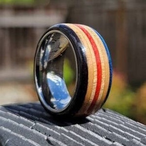 Skateboard Ring With Stainless Steel Comfort Fit Core - Red, Black, and Blue