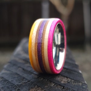 Skateboard Ring With Stainless Steel Comfort Fit Core - Yellow, Purple, and Pink