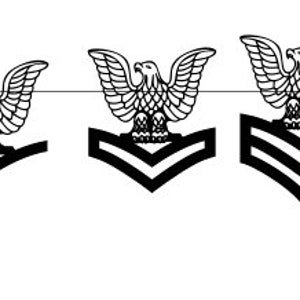 May include: Three black and white military rank insignia with an eagle design. The insignia have one, two, and three chevrons.