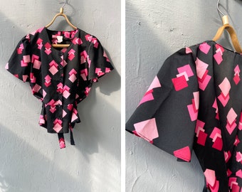 Vintage jaren 90 geometrische peplumblouse: roze en zwart, maat S-M