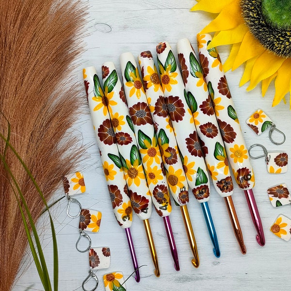 Crochet hooks with sunflowers,autumn flowers and matching stitch markers ,