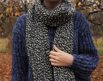 Crochet black and white scarf. Very thick scarf created using black and white spotted yarn.