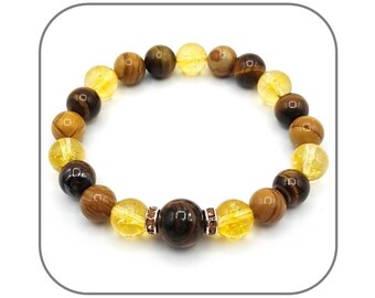 May include: A brown, yellow, and gold beaded bracelet with a tiger's eye bead in the center.