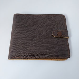 Cartera de piel marrón con interior marrón claro. Piel de becerro. Vintage de los años 70. Fabricada en Inglaterra. En perfecto estado. Un regalo fantástico.