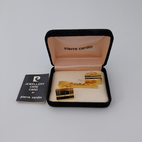 Vintage Pierre Cardin Gold Plated Cuff Links & Tie Clip. Boxed with Initial J on Cuff Links. Unused. Great Condition. Perfect Gift