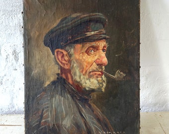 Portret van een pijprokende visser, romantisch rond 1910