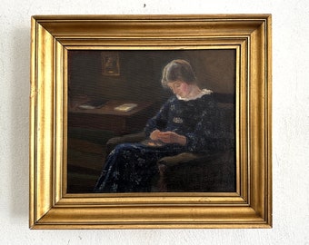 Ritratto di donna in abito blu in poltrona, romantico, dipinto ad olio intorno al 1930