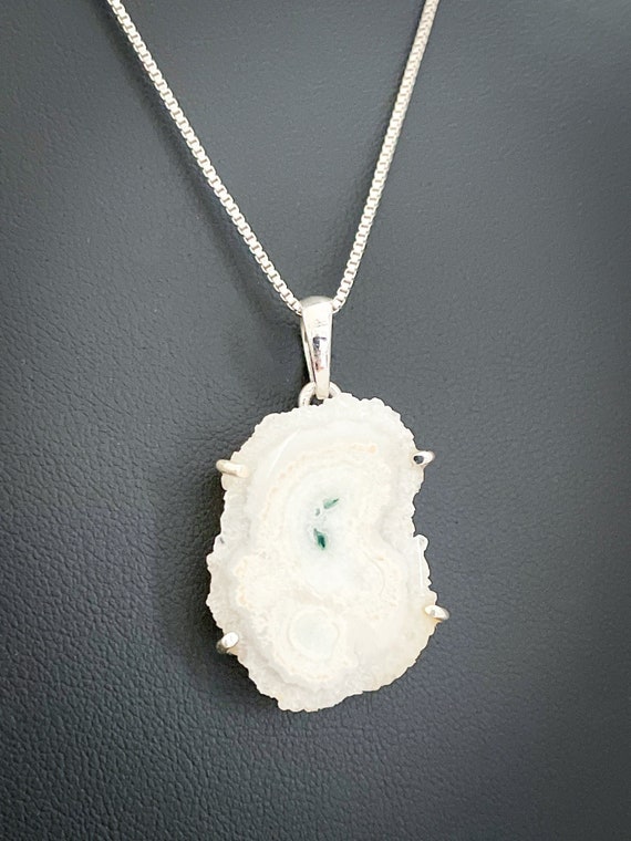 Solar quartz best sale pendant
