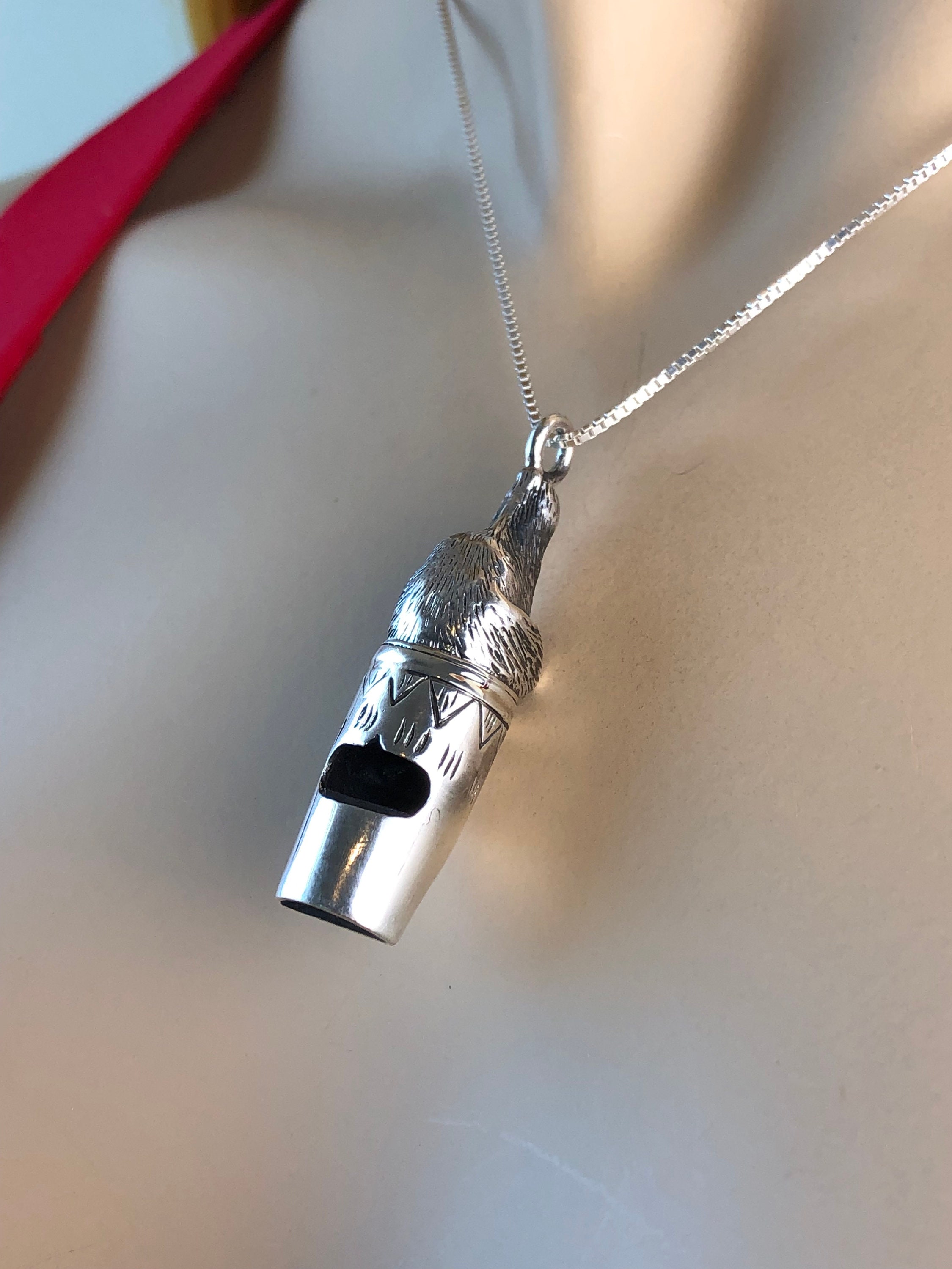 Silver dog whistle best sale necklace