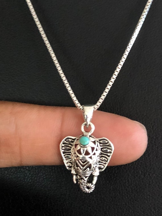 Turquoise elephant necklace deals