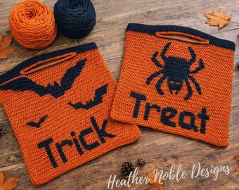 May include: Two orange and black crochet bags with integrated handles. One bag features a black bat graphic and the word Trick, while the other displays a black spider graphic and the word Treat. Two yarn balls are positioned above the bags.